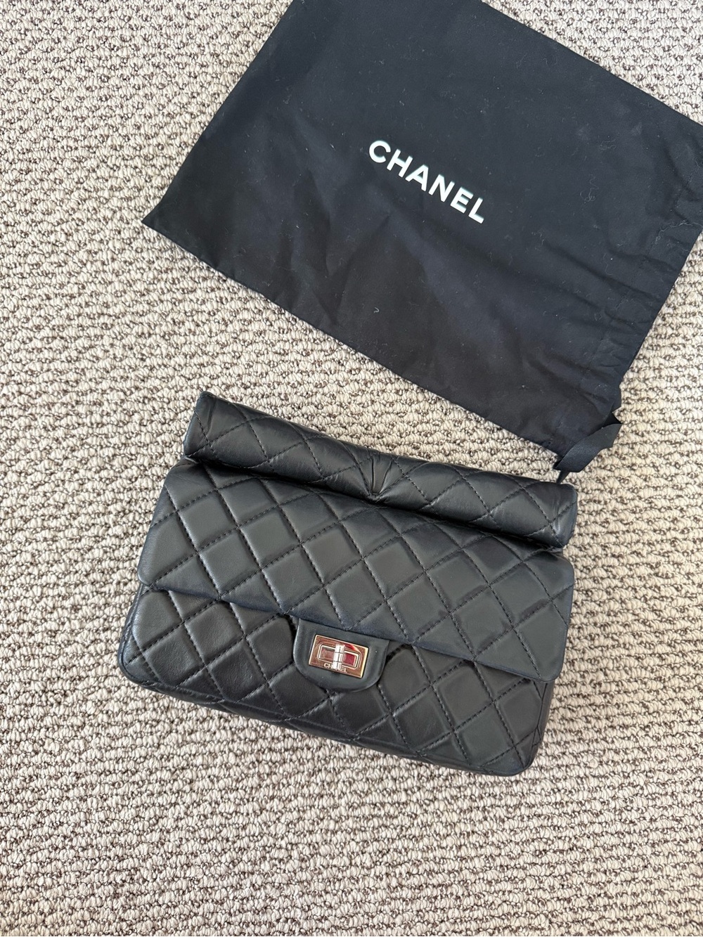 Chanel Runway Black Medium 2.55 Reissue
Quilted Lambskin Roll Clutch